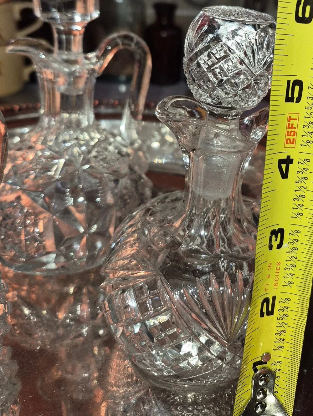 3 Vintage or Antique cut-glass cruets with matching stoppers and handles